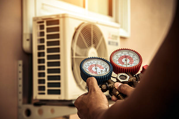 Professional Heat Pump Repair technician working in Grand Island, FL